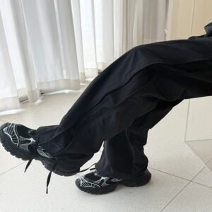 Pantalones casuales rectos sueltos y finos de malla lateral